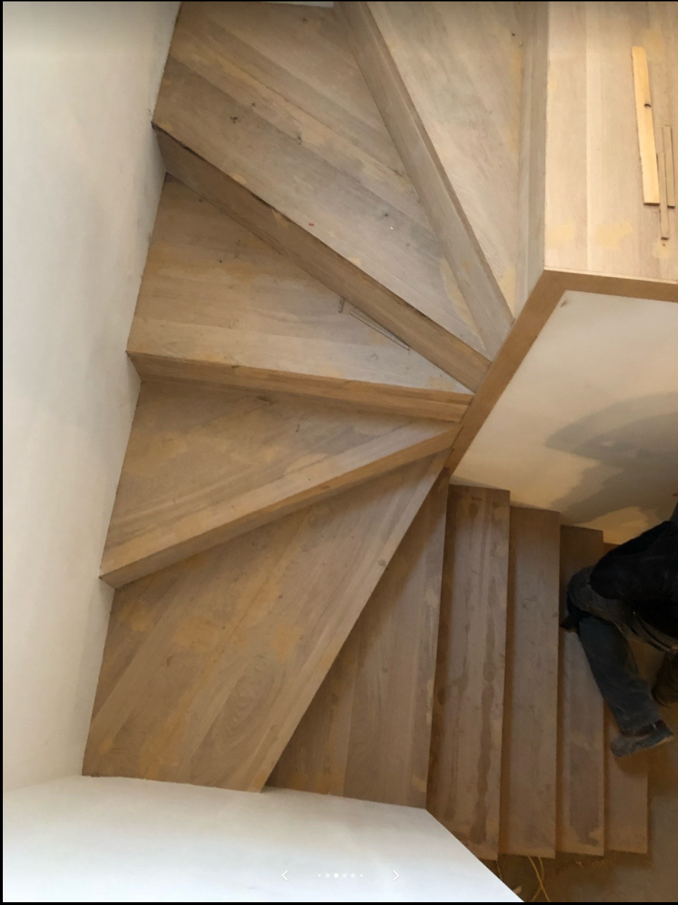 Unfinished light wood staircase and landing before the final finishing stage